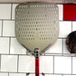 Wall holder for pizza peels